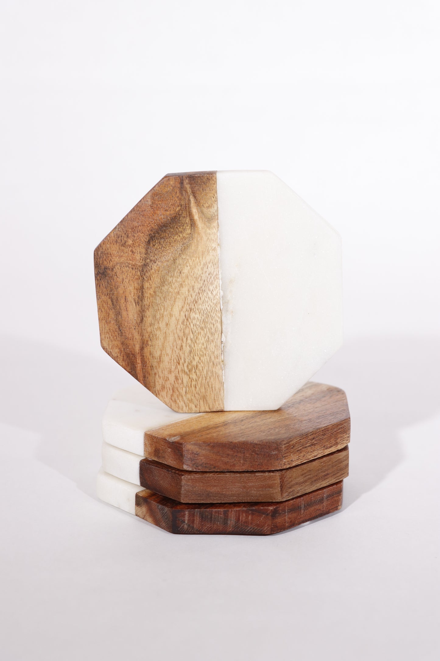 Acacia wood and marble caosters.