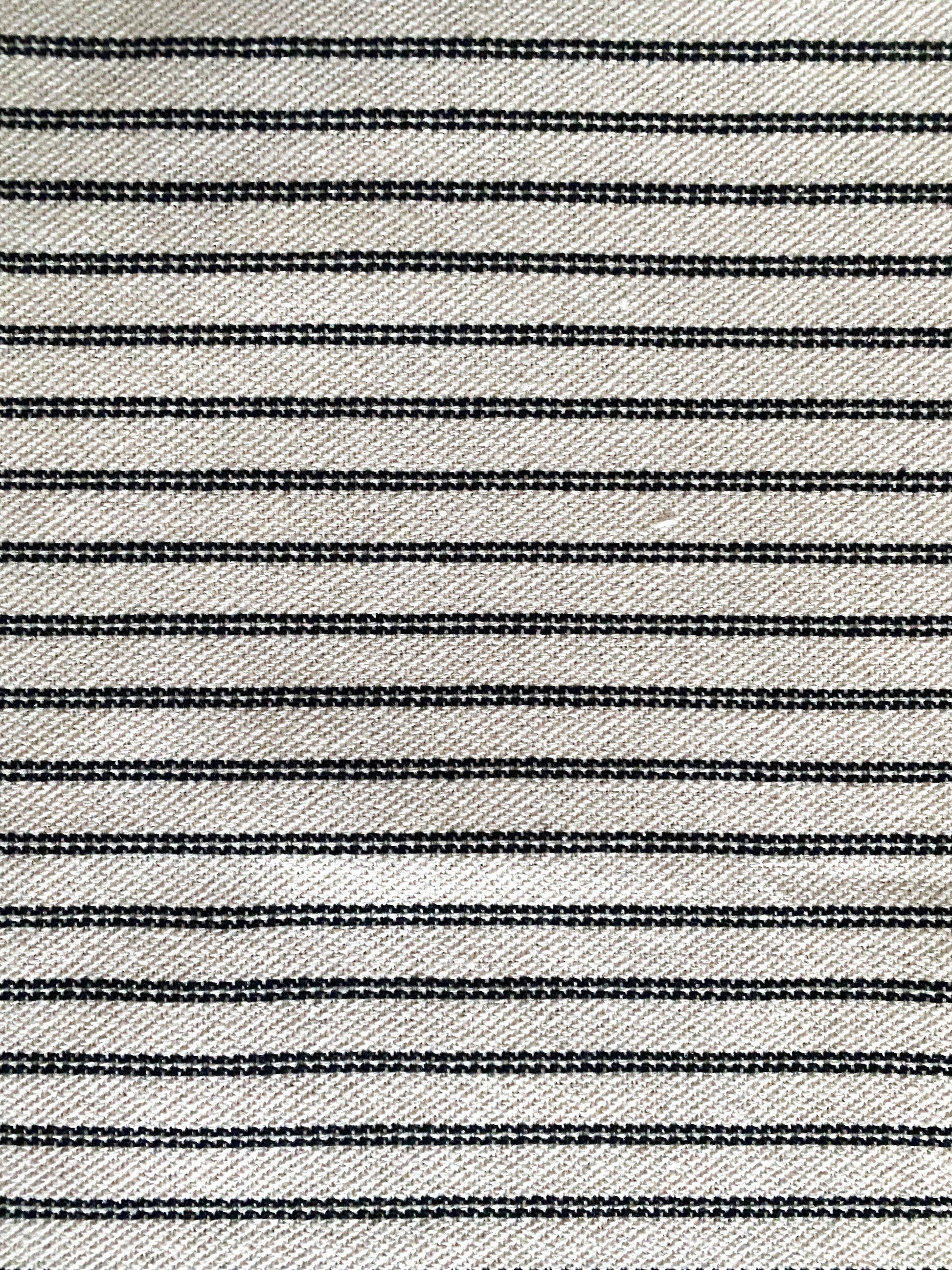 Close up of Amelia black and ivory pillow cover fabric.