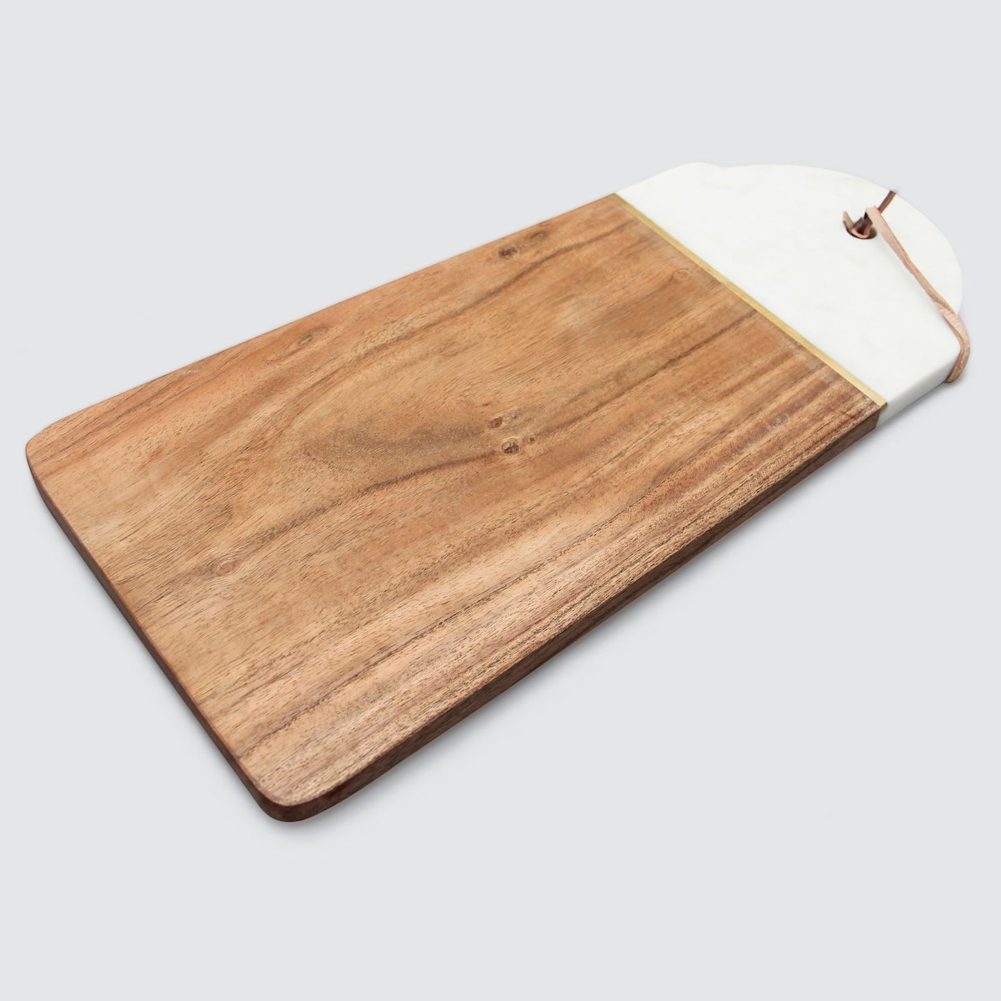 White marble and acacia wood cutting board.