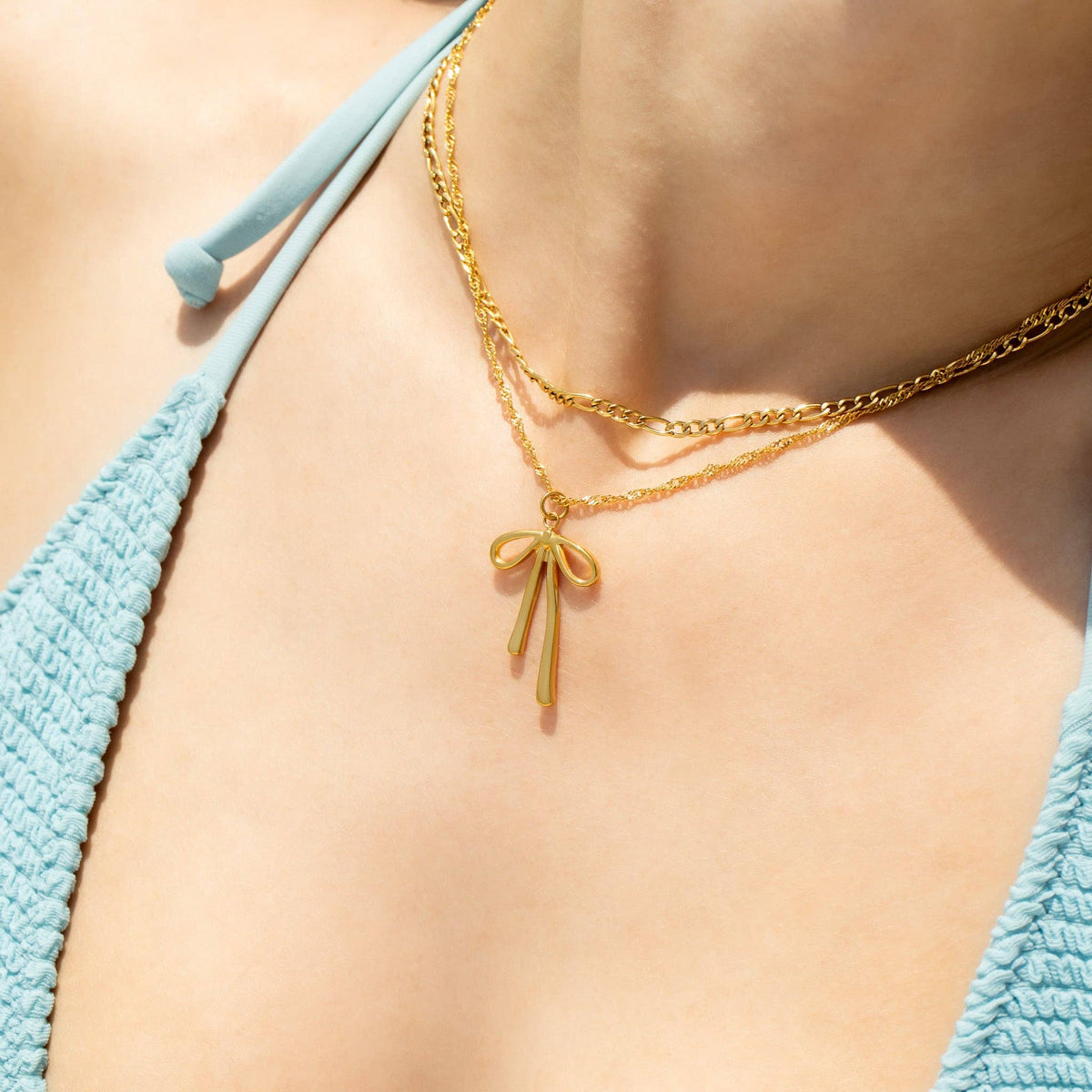 18K Gold PVD Stainless Steel Long Bow Charm: Gold