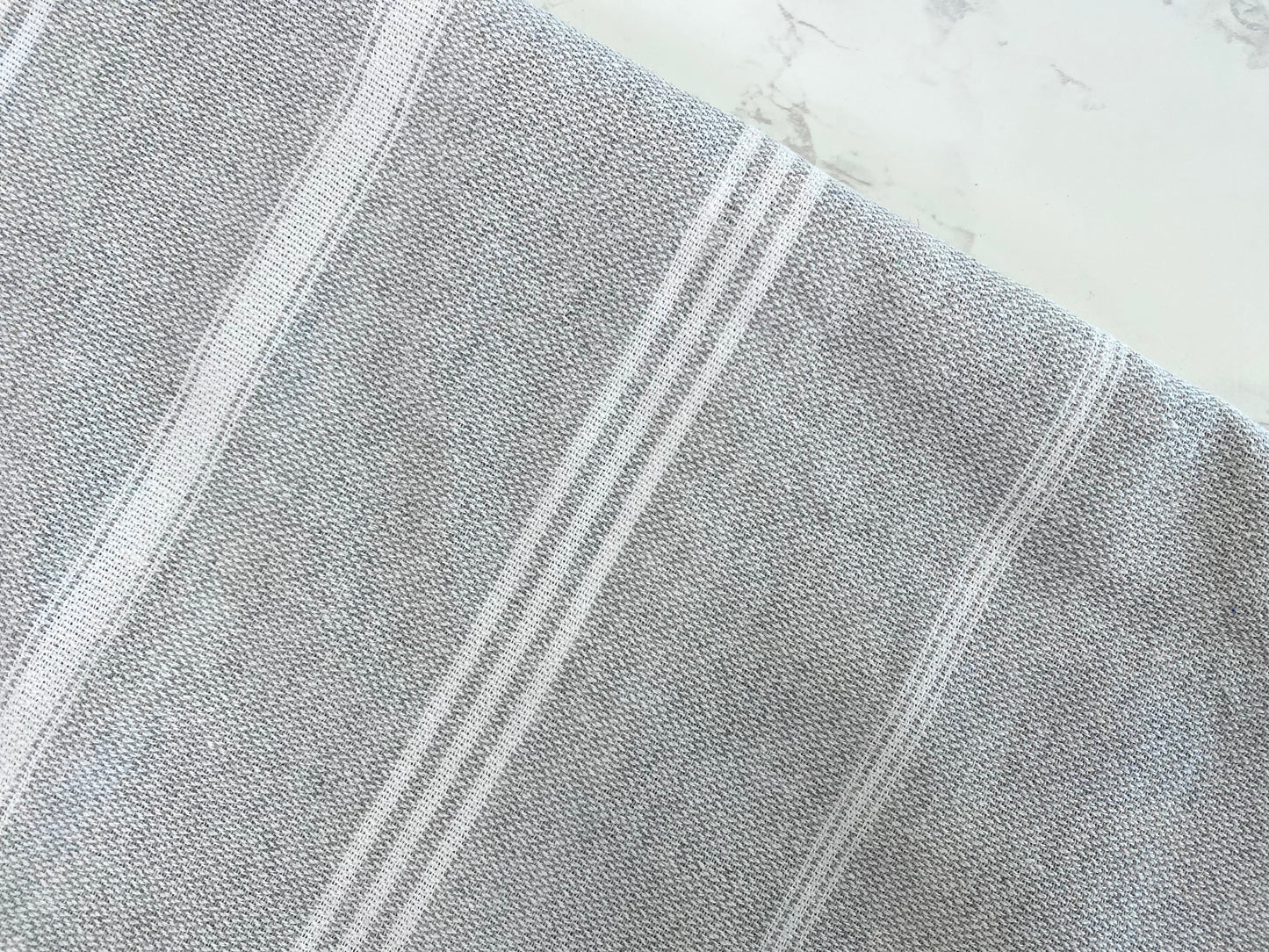 Turkish Towel in light Grey with White stripe. 180 GSM.