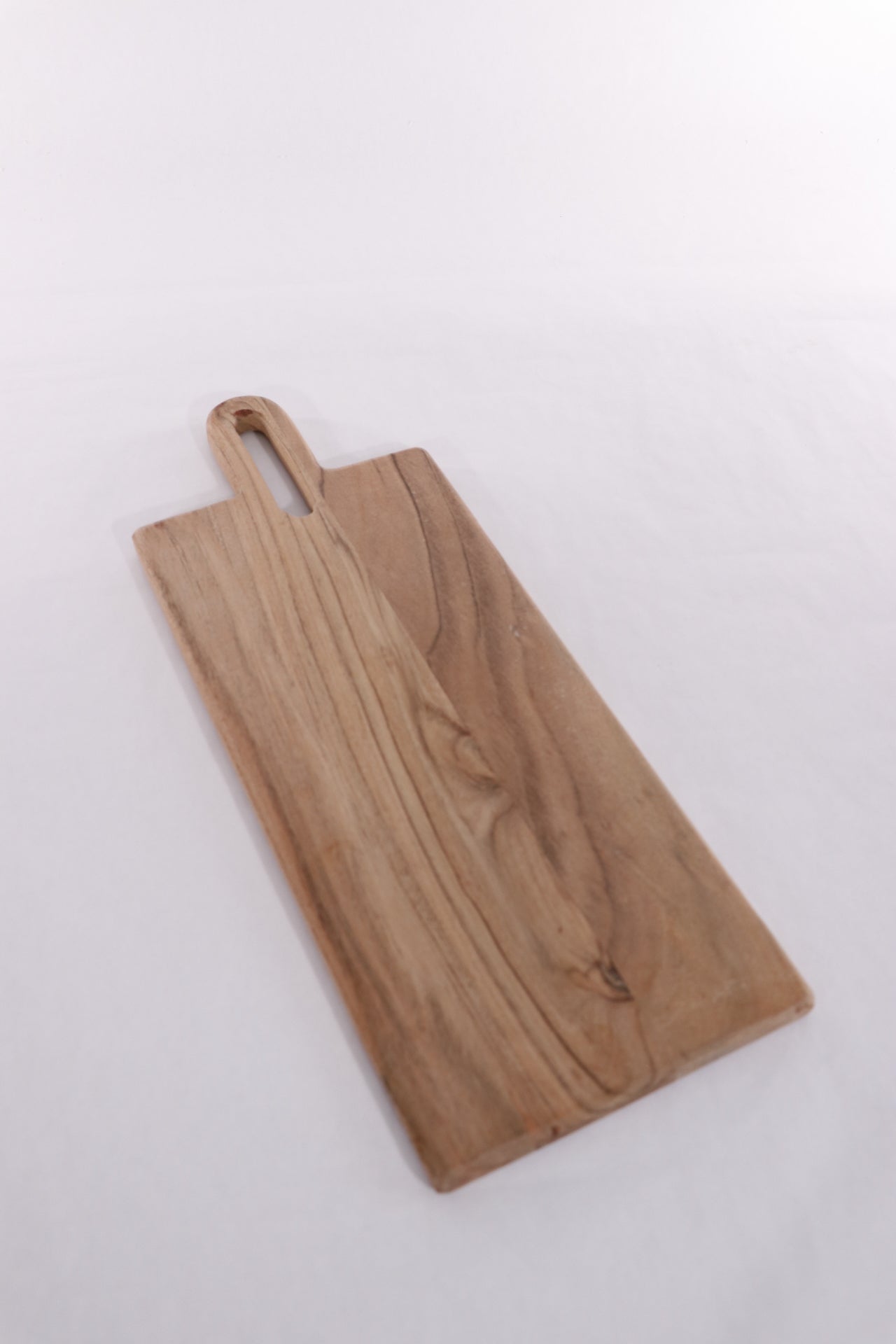 Wood serving board with handle.